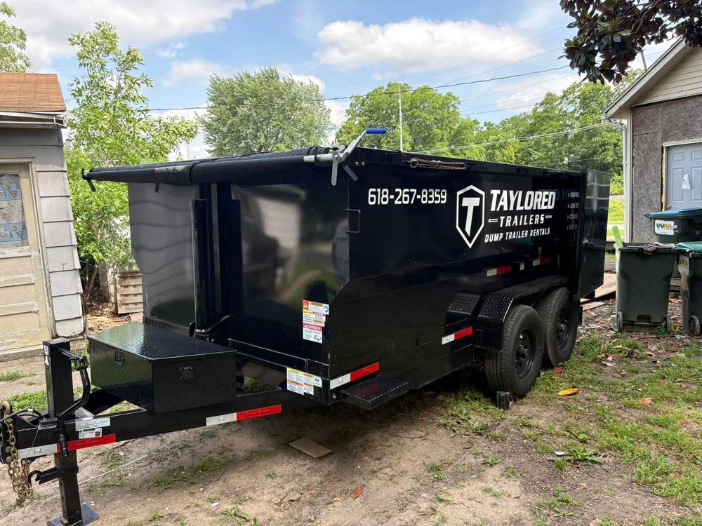 Dump trailer at residential cleanup project