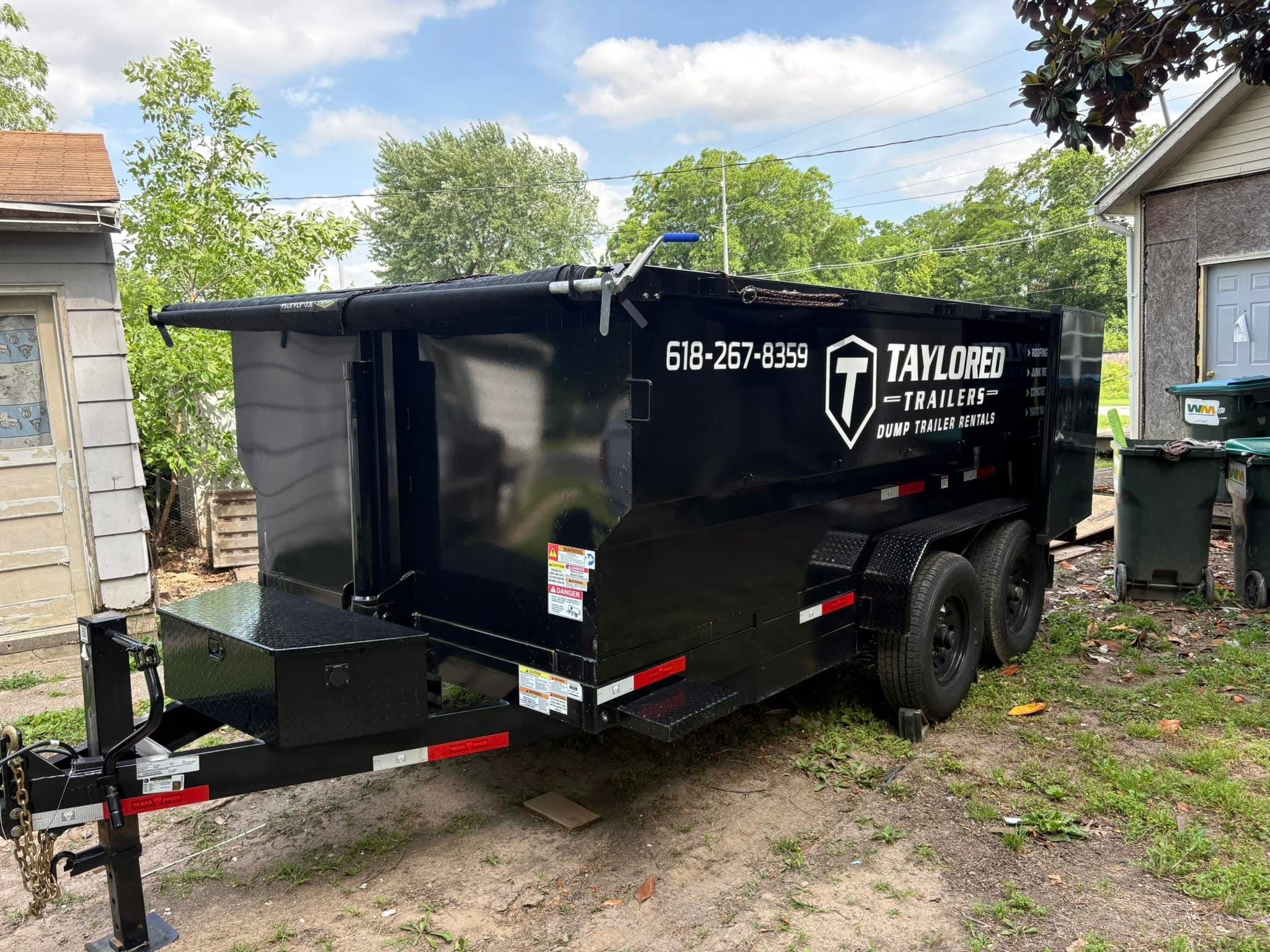 Dump trailer at residential cleanup project