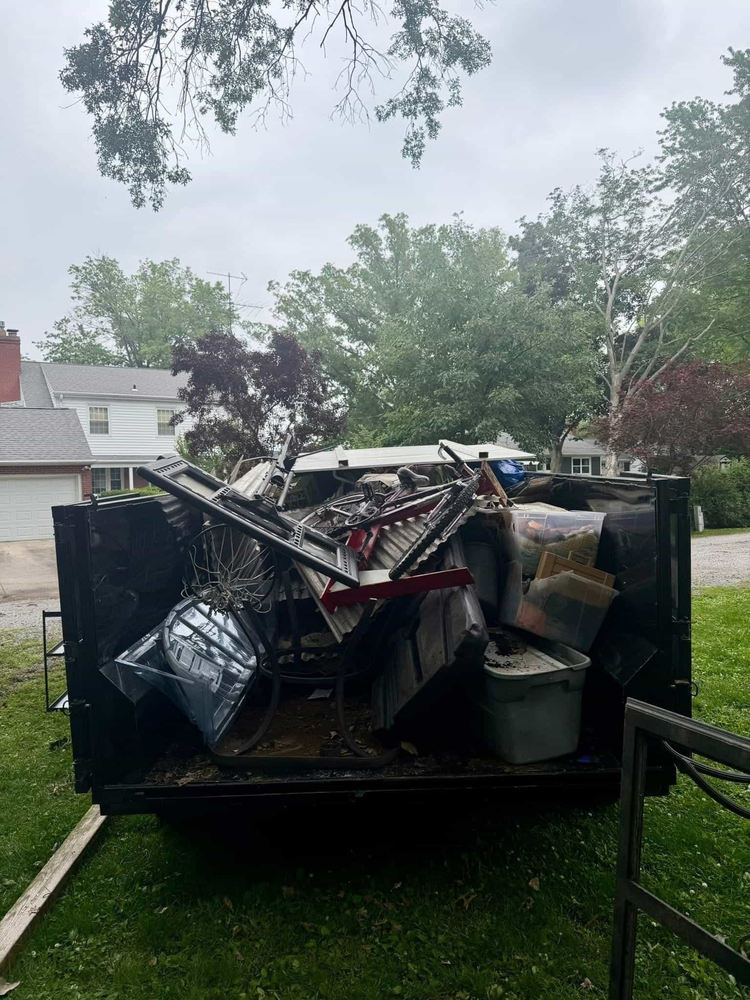 Loaded dump trailer during a residential cleanout